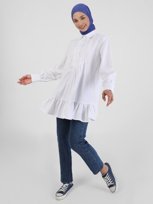 Off White Fırfır Ve Nervür Detaylı Tunik Off White Fırfır Ve Nervür Detaylı Tunik