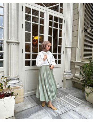 Piliseli Deri Görünümlü Tesettür Etek Piliseli Deri Görünümlü Tesettür Etek