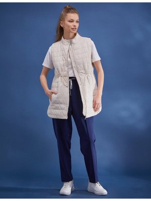 Bel Büzgülü Dik Yaka Şişme Yelek Krem Bel Büzgülü Dik Yaka Şişme Yelek Krem