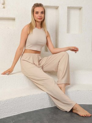 Beli Lastikli Bej Renk Bol Paça Pantolon