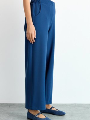 Beli Lastikli Düz Paça Pantolon İndigo