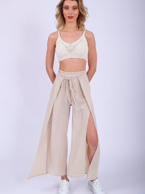 Taş Yüksel Bel Lastikli Yırtmaçlı Pantolon Taş Yüksel Bel Lastikli Yırtmaçlı Pantolon