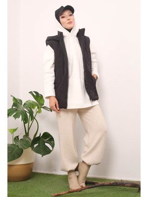 Siyah Kapüşonlu Astarlı Fermuarlı Gizli Cep Detaylı Şişme Yelek Siyah Kapüşonlu Astarlı Fermuarlı Gizli Cep Detaylı Şişme Yelek