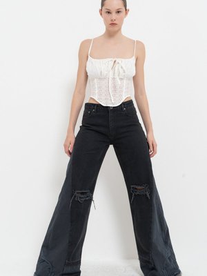 Siyah Yırtık Detaylı Bol Paça Pantolon