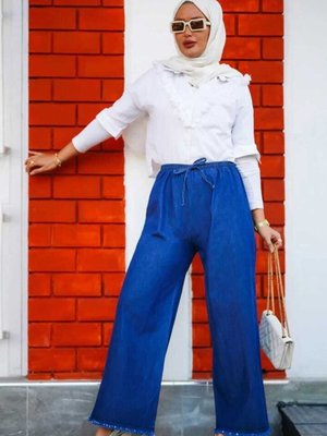 Açık Mavi Belde Bağcıklı Ucu Püsküllü Bol Paça Kumaş Kot Pantolon Açık Mavi Belde Bağcıklı Ucu Püsküllü Bol Paça Kumaş Kot Pantolon