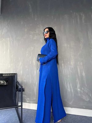 Petrol Mavisi Balıkçı Yaka Eteği Yırtmaçlı Fitilli Elbise Ve Geniş Pantolon İkili Triko Takım Petrol Mavisi Balıkçı Yaka Eteği Yırtmaçlı Fitilli Elbise Ve Geniş Pantolon İkili Triko Takım