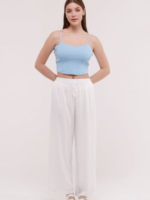 Beyaz Yazlık Bel Lastikli Şık Dokuma Viskon Düz Kumaş Salaş Pantolon Beyaz Yazlık Bel Lastikli Şık Dokuma Viskon Düz Kumaş Salaş Pantolon