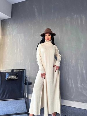 Taş Balıkçı Yaka Eteği Yırtmaçlı Fitilli Elbise Ve Geniş Pantolon İkili Triko Takım Taş Balıkçı Yaka Eteği Yırtmaçlı Fitilli Elbise Ve Geniş Pantolon İkili Triko Takım