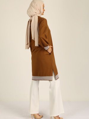 Balon Kol Bisiklet Yaka Yanları Yırtmaçlı Triko Detaylı Cepli Salaş Tunik Balon Kol Bisiklet Yaka Yanları Yırtmaçlı Triko Detaylı Cepli Salaş Tunik