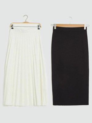 Siyah Kalem Beyaz Piliseli Uzun Etek Siyah Kalem Beyaz Piliseli Uzun Etek