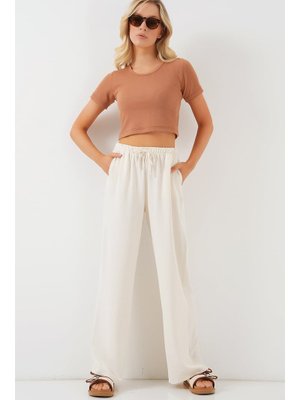 Krem Yüksek Bel Bol Paça Pantolon Krem Yüksek Bel Bol Paça Pantolon