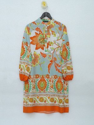 Turuncu Çiçek Desenli Yarım Düğmeli Pamuk Viskon Tunik Turuncu Çiçek Desenli Yarım Düğmeli Pamuk Viskon Tunik