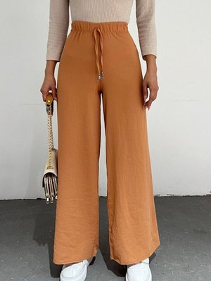Kayısı Rengi Bağcık Detaylı Bol Paça Beli Lastikli Pantolon Kayısı Rengi Bağcık Detaylı Bol Paça Beli Lastikli Pantolon