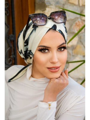 Yaprak Desen Çapraz Bantlı Bone Yaprak Desen Çapraz Bantlı Bone